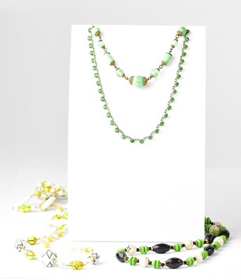 Lot 807 - Nine glass metal Max Neiger necklaces in...