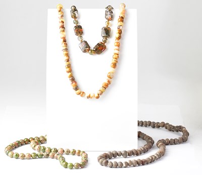 Lot 806 - Nine natural stone, glass and agate bead...