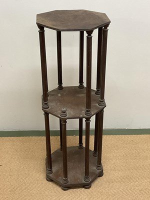 Lot 671 - An early 20th century oak three tier octagonal...
