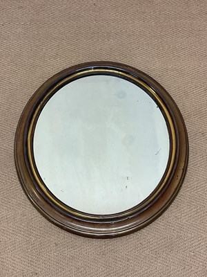 Lot 685 - A 19th century oval brass framed mirror with...