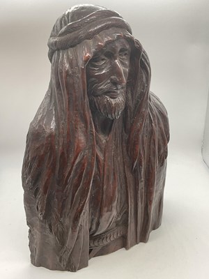 Lot 448 - ALFREDA BERESFORD; a carved oak half length...