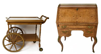 Lot 1732 - A reproduction French style knee-hole walnut...