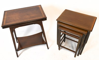 Lot 1586 - An Edwardian inlaid mahogany swivel fold over...