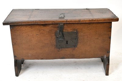 Lot 1667 - An 18th century oak plank top coffer of small...