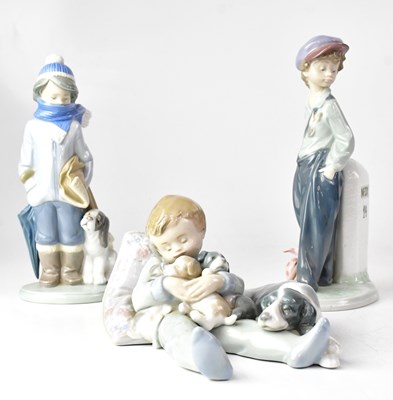 Lot 380 - LLADRÓ; three figures of boys, comprising...