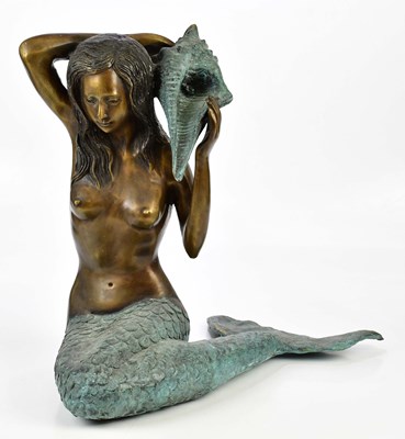 Lot 1442 - A modern decorative patinated bronze figure of...
