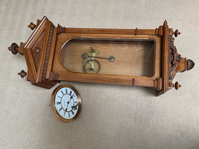 Lot 1519 - G. P. WEHLEN & CO; an oak cased wall clock,...