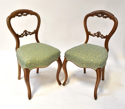 Lot 14 - A set of six Victorian walnut balloon back...