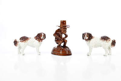 Lot 2767 - A pair of 19th century Staffordshire spaniels,...