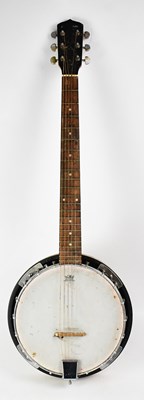Lot 529 - A Martin Smith banjo in soft carry case (af).