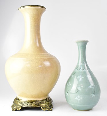 Lot 428 - A celadon-style crackle glaze vase of onion...