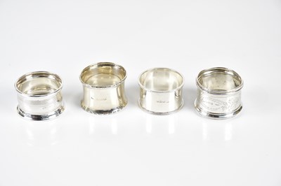Lot 2523 - A collection of four hallmarked silver napkin...