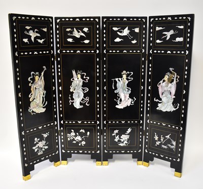 Lot 38 - A contemporary black lacquered and mother of...