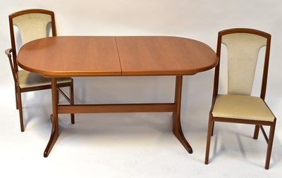 Lot 37 - E. S. A. & MCINTOSH LTD; a mahogany dining...