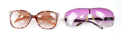 Lot 419 - PRADA; a pair of PR 01OS ladies' sunglasses in...