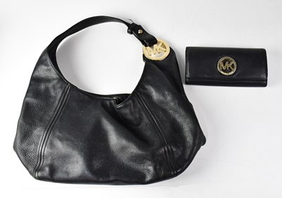 Lot 424 - MICHAEL KORS; a black pebbled leather hobo...
