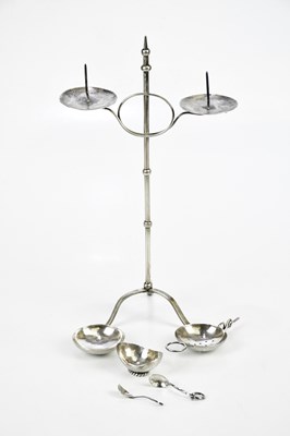 Lot 2185 - A white metal candle holder, together with...