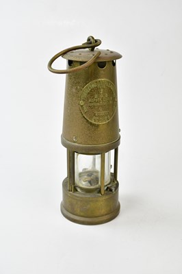 Lot 1281 - A vintage brass miner's lamp, 'The Protector...