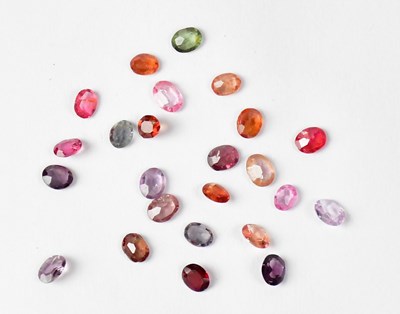 Lot 858 - Twenty-four loose gemstones, various colours...