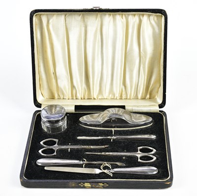 Lot 2224 - DANIEL MANUFACTURING COMPANY; a cased George V...