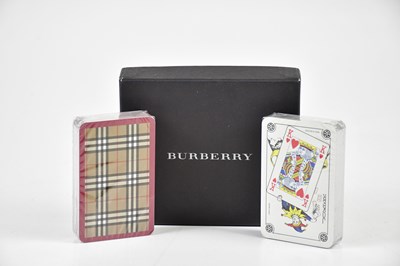 Lot 864 - BURBERRY; two packs of unused playing cards in...