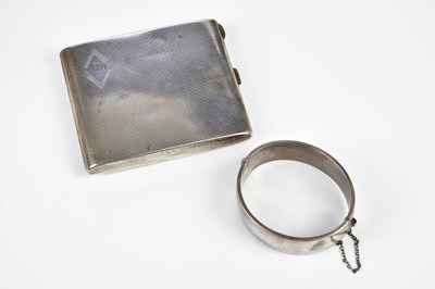 Lot 529 - A silver engraved hinged snap bangle, af, and...