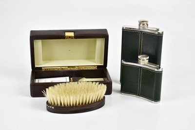 Lot 1322 - DUNHILL; two stainless steel and pebbled green...