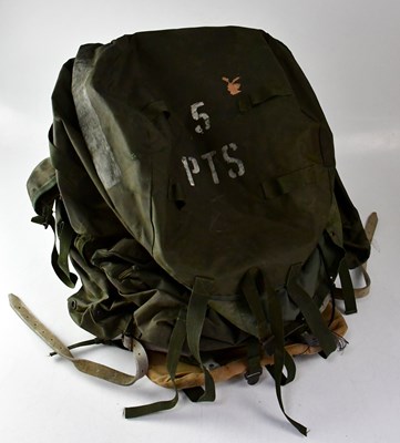 Lot 615 - A 1970s military issue rucksack with black...
