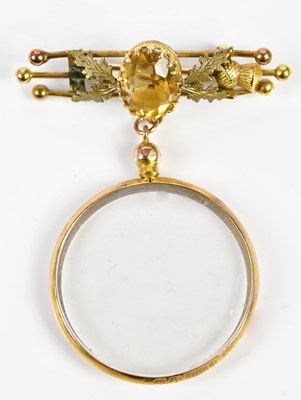 Lot 449 - A 9ct yellow gold bar brooch set with citrine...