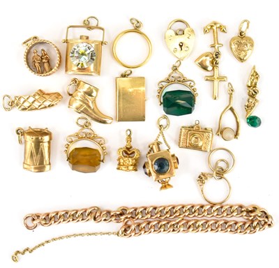 Lot 1042 - A 9ct rose gold bracelet with seventeen...