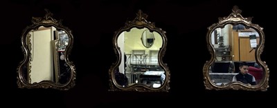 Lot 53 - A set of three gilt framed wall mirrors,...
