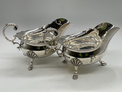 Lot 1085 - WALKER & HALL; a pair of George V hallmarked...