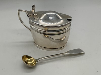 Lot 1088 - An Edwardian hallmarked silver lidded mustard...