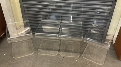 Lot 40 - A set of four modern acrylic ghost type chairs.