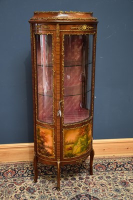 Lot 1007 - A reproduction French style vitrine, with...