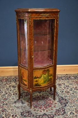 Lot 1101 - A reproduction French style serpentine fronted...
