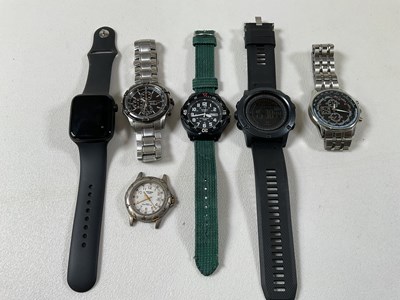 Lot 1307 - A group of six watches including a Seiko solar...