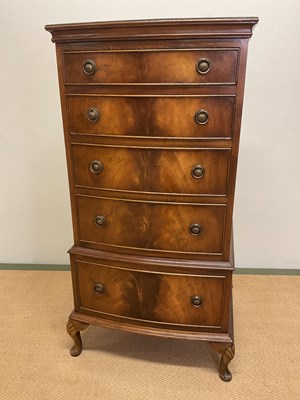 Lot 680 - A reproduction mahogany bowfronted chest on...