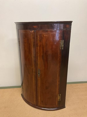 Lot 695 - A George III mahogany and inlaid bowfronted...