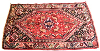 Lot 122 - A hand-knotted Mawarad rug, in pink, grey,...