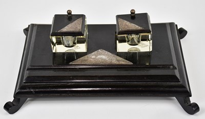 Lot 2497 - An ebony desk stand with detachable glass...