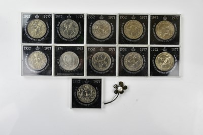 Lot 561 - A sterling silver floral brooch set with...