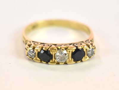 Lot 1150 - An 18ct yellow gold five stone diamond and...
