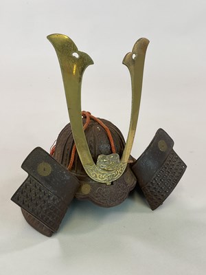Lot 83 - A Japanese cast metal model of a yoshitsune...
