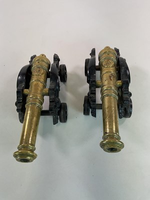 Lot 10 - A large pair of Victorian table cannon, each...
