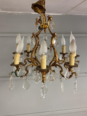 Lot 534 - Two brass and cut glass ceiling lights, both...