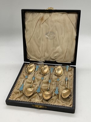 Lot 1061 - DAVID ANDERSEN; a cased set of six silver gilt...