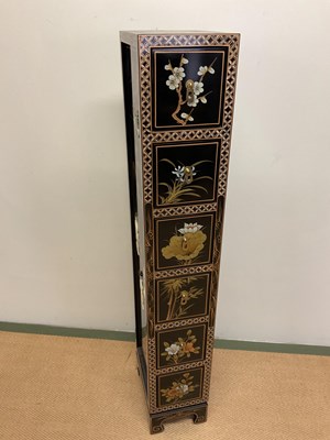 Lot 655 - A tall contemporary Chinese lacquered chest of...