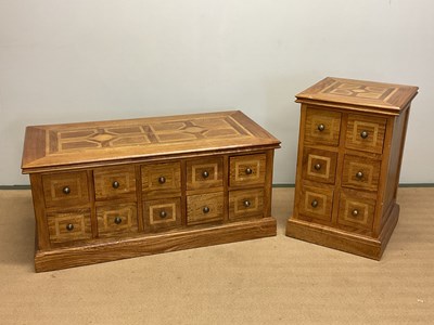 Lot 638 - A substantial low double sided chest/coffee...