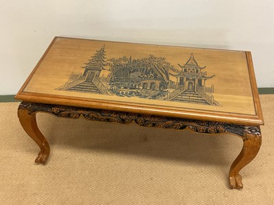 Lot 712 - A contemporary carved Chinese coffee table,...